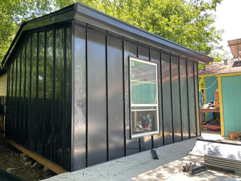 Black standing seam metal wall panels for Roof Inspection in Blair